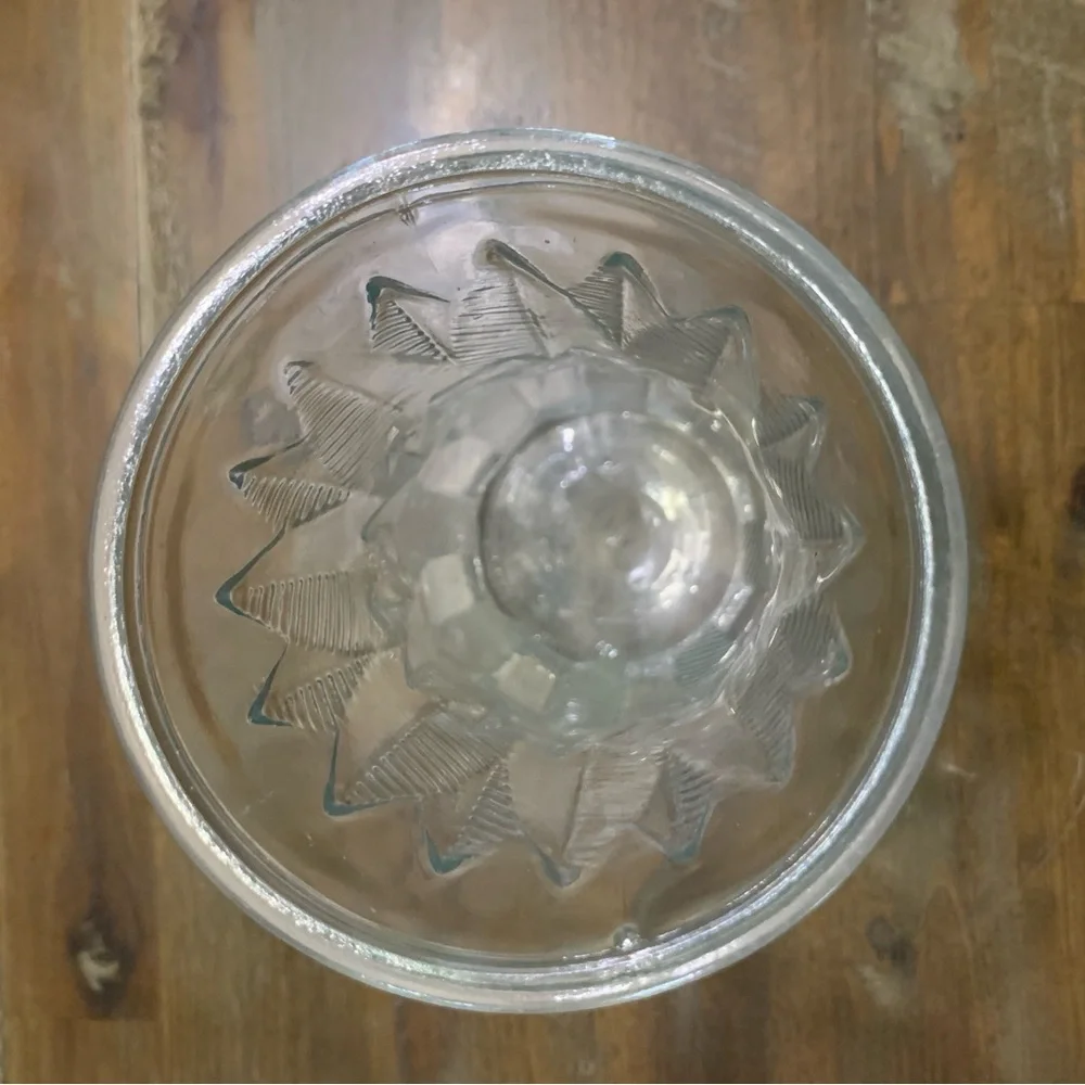 Clear glass floral vase with etched design